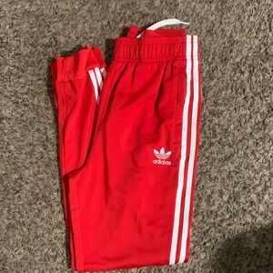 Adidas Kids Red Joggers with White Stripes size Large
